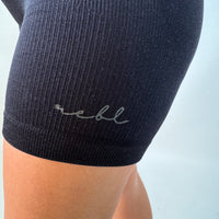 Load image into Gallery viewer, Luxe Black r.e.b.l Logo High Waisted Ribbed Shorts
